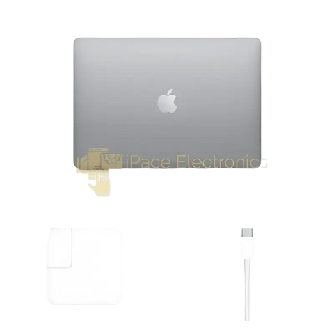 Apple MacBook Air 2020 for sale with charger and USB-C cable in a sleek silver design