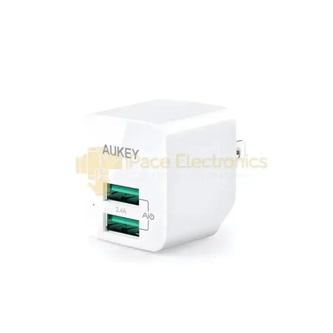 Aukey dual port travel charger in white with two USB ports for fast charging on the go
