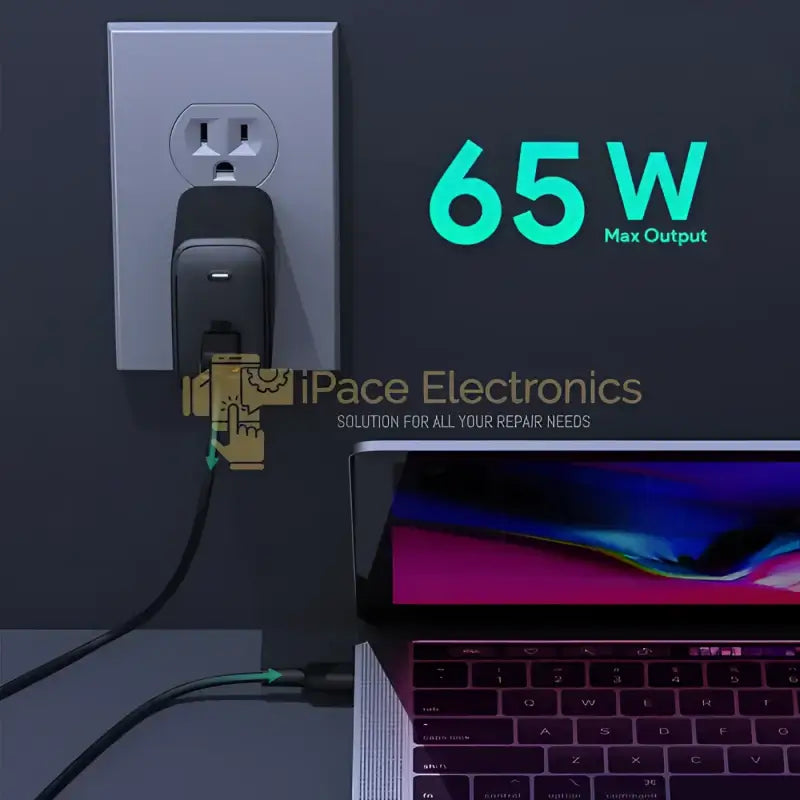 AUKEY Omnia 65W USB C charger plugged into an outlet with a device charging, showcasing its 65W maximum output.