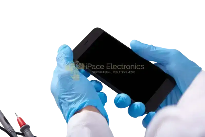 Samsung Galaxy A screen replacement held by a technician in blue gloves with repair tools in the background