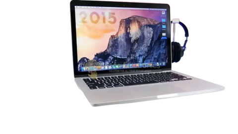 Apple MacBook Pro 13.3 inch 2015 displayed on its box, showcasing sleek design and vibrant screen