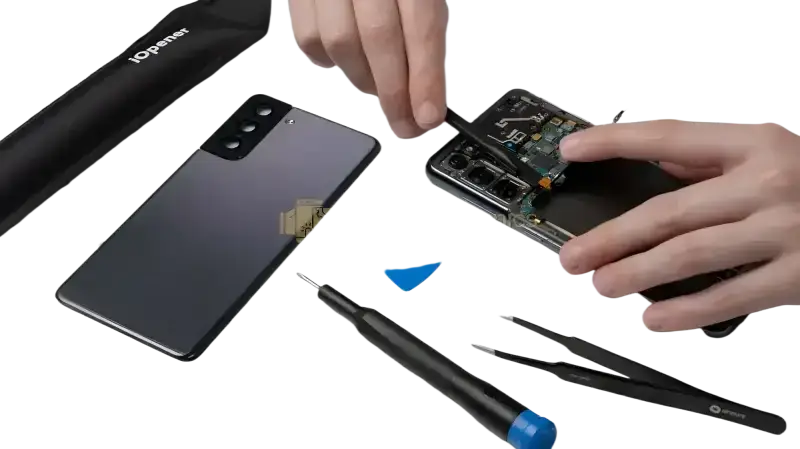 Samsung Galaxy S screen repair process with tools and smartphone components displayed